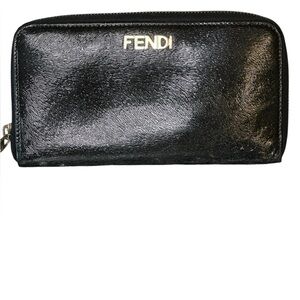 Vintage Fendi black patent leather zip-around continental wallet.
